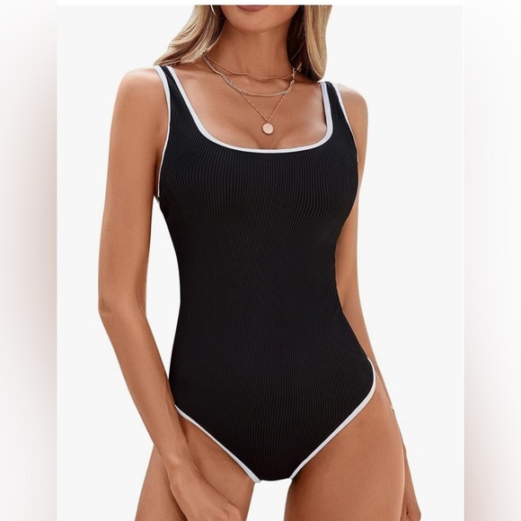 Other - NEW- Elegant Black Ribbed
white trim Swimsuit
2025 Season
Large